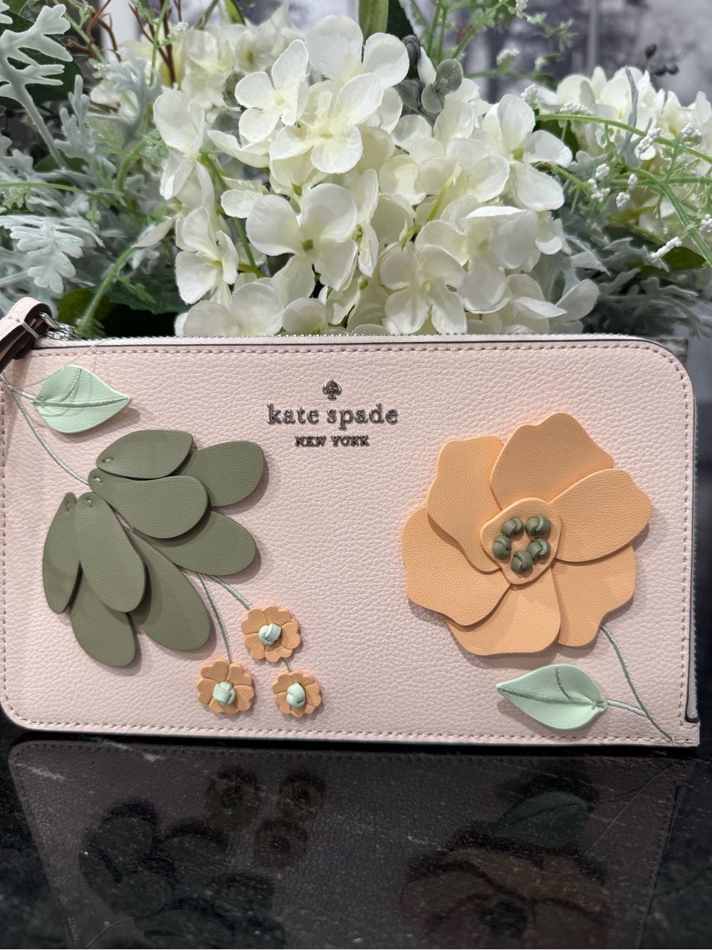 kate spade blush pink floral zip wallet with peach and sage appliqués